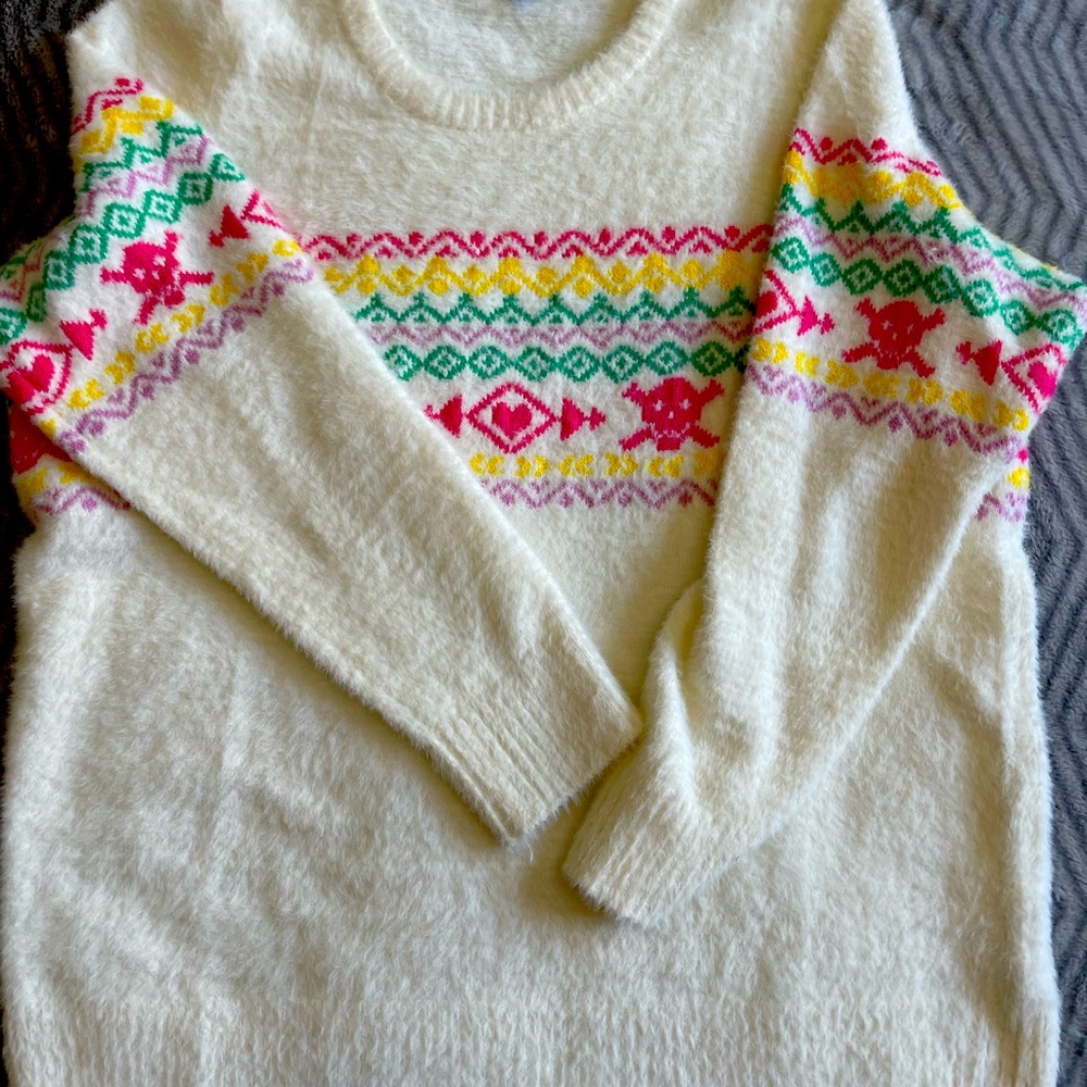 Torrid Sweater in Cream with Skulls